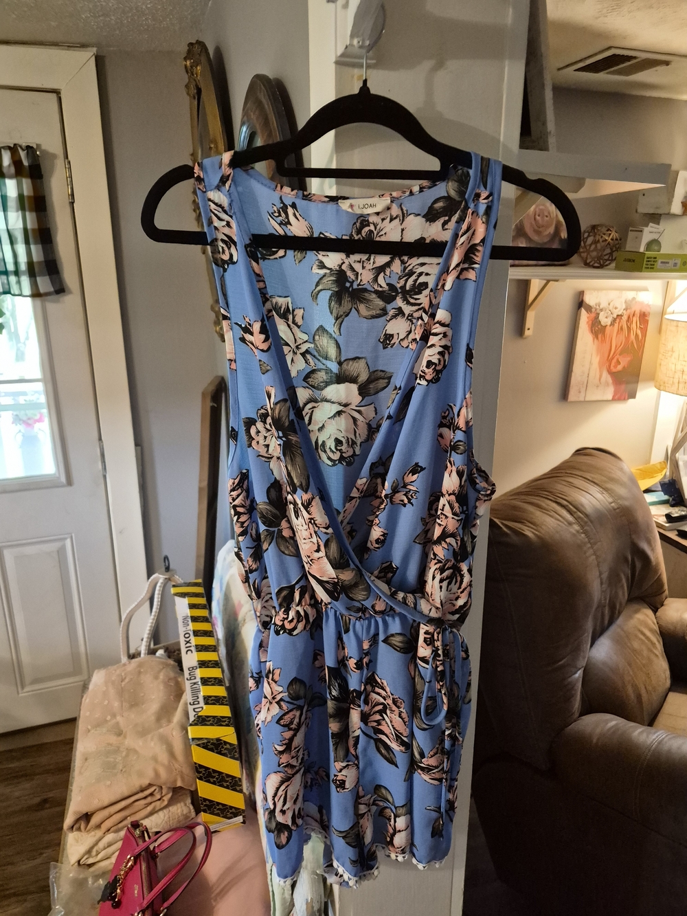 LJOH floral romper features a blue base with pink and green flowers and a wrap-s